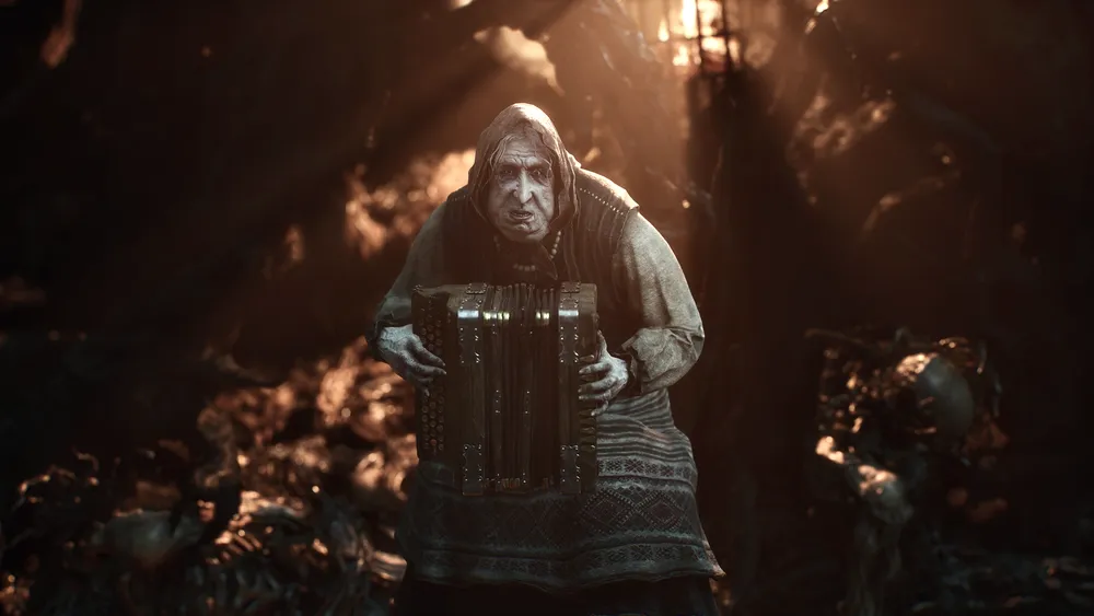 A close view of an armored Mortal Shell II character lit by fire.