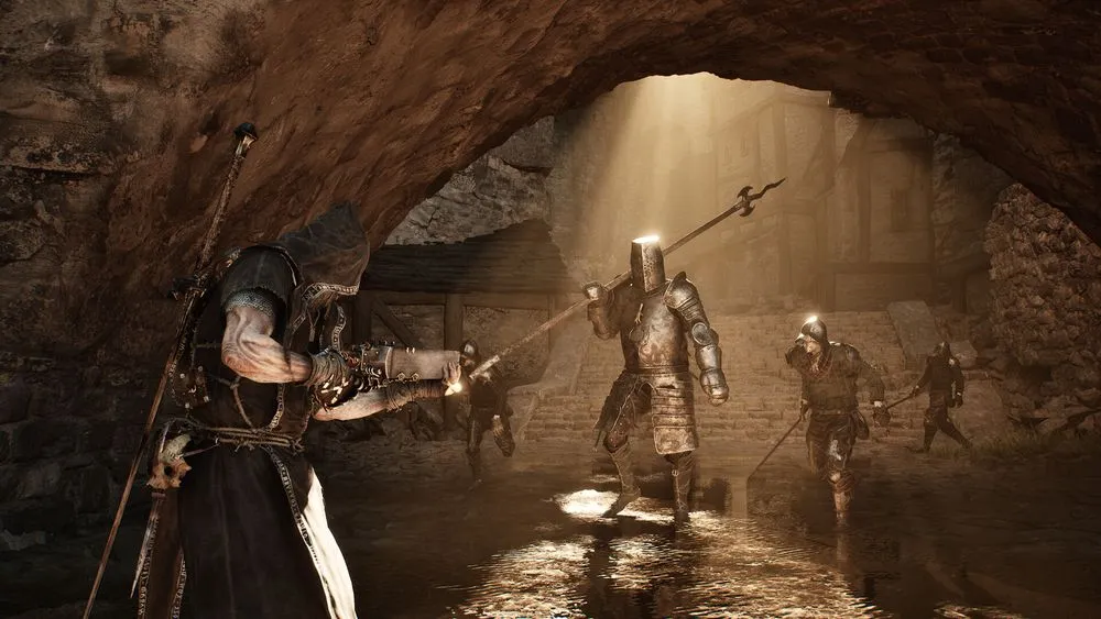 Mortal Shell II characters gathered in warm-lit underground ruins.